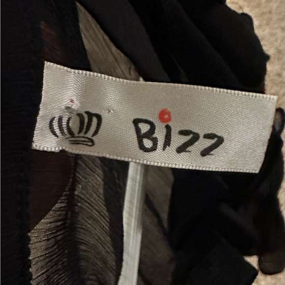 Sheer, black blouse. Ruffled button down front. - Picture 4 of 4